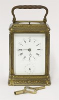 Lot 301 - A brass repeat alarm carriage clock