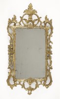 Lot 471 - A carved giltwood wall mirror