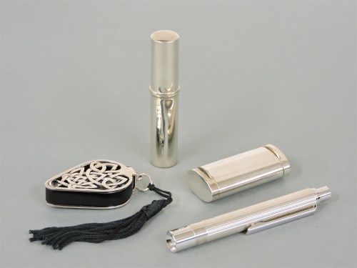 Lot 24 - A sterling silver torch