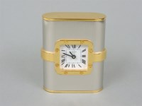 Lot 11 - A Cartier bicolour Santos quartz clock
