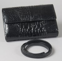 Lot 374 - A black vintage crocodile skin clutch bag