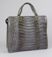 Lot 394 - A vintage Apoll grey crocodile handbag