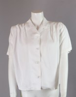 Lot 159 - An ivory blouse