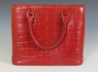 Lot 379 - A vintage Louis Vuitton red crocodile patterned leather handbag