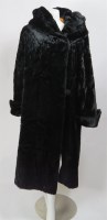 Lot 241 - An early 20th century black cotton plush moleskin coat
