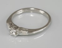 Lot 1007 - An 18ct white gold single stone princess cut diamond ring