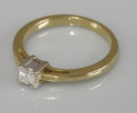 Lot 1008 - A single stone princess cut diamond ring