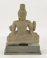 Lot 23 - A Thai carved sandstone figure of a seated Buddha