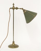 Lot 146 - An adjustable brass table lamp