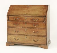 Lot 395 - A George III elm bureau