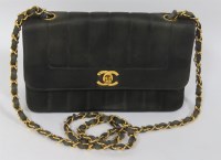 Lot 410 - A Chanel vertical fabric quilted flap shoulder bag
