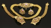 Lot 310 - A Regency three colour gold foiled topaz and emerald parure