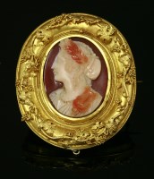 Lot 333 - A Victorian carved hardstone gold cameo oval brooch