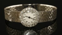 Lot 509 - A ladies' Art Deco diamond set mechanical cocktail watch