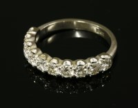 Lot 526 - A white gold ten stone diamond half eternity ring