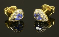 Lot 536 - A pair of sapphire and diamond cluster earrings