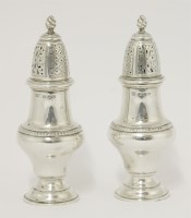 Lot 186 - A pair of silver casters