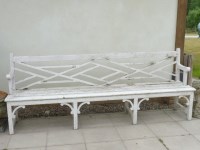 Lot 791 - A white painted garden bench