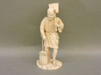 Lot 589 - A late 19th century sectional ivory gardener