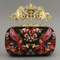 Lot 433 - An Alexander McQueen unicorn and skull knuckle box clutch