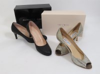 Lot 147 - A pair of Jimmy Choo glitter open toe court shoes