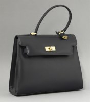Lot 408 - A Wigmore navy leather handbag
