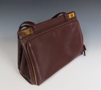 Lot 417 - A Gucci brown Epi-style leather handbag
with gilt twist lock hardware