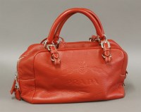 Lot 368 - A Prada red leather handbag