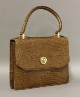 Lot 428 - A Gucci 1950s brown crocodile handbag