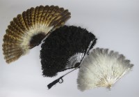 Lot 174 - A late 19th century feather fan