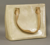 Lot 364 - A Louis Vuitton golden yellow patent leather vernis 'Houston' tote bag