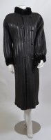Lot 242 - A Sprung Frères Paris black leather and suede lambskin coat