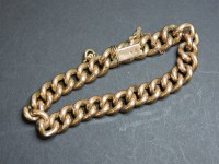 Lot 99 - A hollow curb chain bracelet