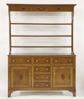 Lot 473 - A George III oak and pine dresser