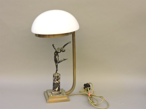 Lot 1517 - An Art Deco style bronze and marble figural table lamp