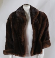 Lot 315 - A dark brown mink fur batwing sleeved jacket