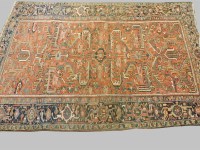 Lot 881 - A Persian Heriz carpet