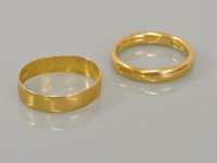 Lot 32 - Two 22ct gold wedding rings