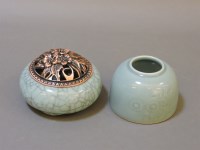 Lot 150 - A Chinese celadon brush pot