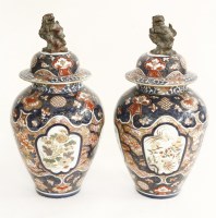 Lot 375 - A decorative pair of Paris 'Arita Imari' vases and covers