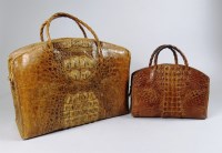 Lot 207 - A 1950s crocodile skin travel bag