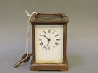 Lot 130 - A brass carriage clock