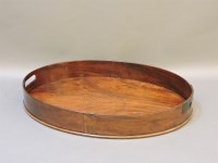 Lot 486 - A mahogany oval tray