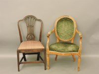 Lot 494 - A George III adapted open elbow chair