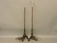 Lot 560 - A pair of standard lamps