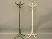 Lot 570 - Two painted hat stands