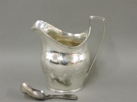 Lot 127 - A Georgian silver cream jug