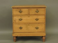 Lot 456 - A 19th century stripped pine chest of two short and two long drawers