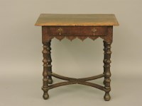 Lot 461 - An 18th century oak side table