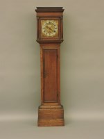 Lot 581 - A 19th century oak longcase clock